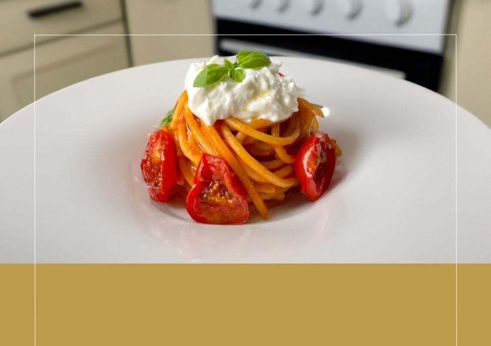 Pasta with cherry tomatoes confit and stracciatella